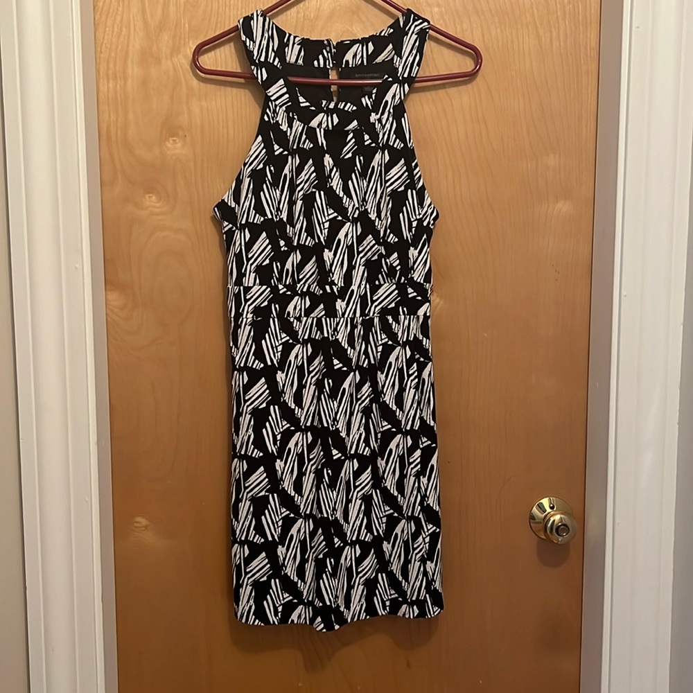 Women’s dress, sleeveless, wrap around style, lined with side zipper